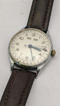 A mid 20th century gents stainless steel triple day, date and month Location: