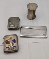 Silver to include an enamelled vesta engraved Liberte, silver coloured vesta, a napkin ring and a