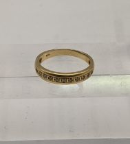 A gold and diamond ring set with diamonds stamped 585 2.7g Location: