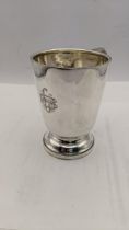 A silver cup having engraved entails hallmarked Birmingham 1954 total weight 208g Location: