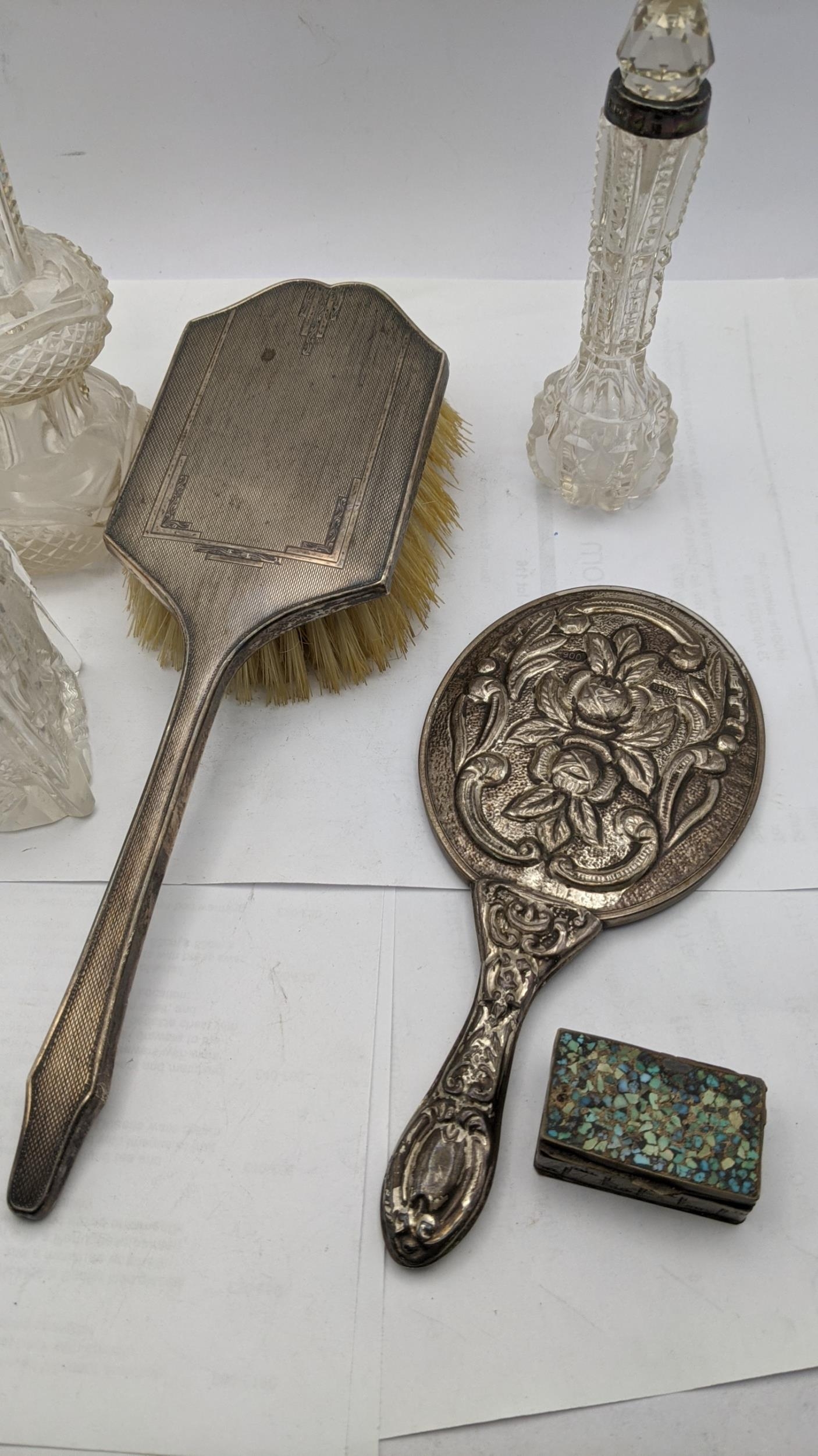 Silver and white metal dressing table items to include a hair brush, an embossed mirror stamped 900, - Image 2 of 3