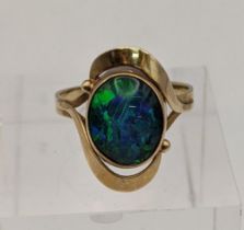 A yellow metal and opal ring tested as 9ct gold total weight 32g Location:
