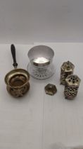 A pair of silver pierced salt and pepper pots, together with a silver lidded dressing table pot,