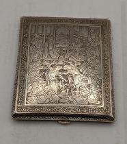 A white metal Indian engraved cigarette case total weight 165.6g Location: