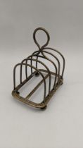 A silver toast rack, hallmarked London 1880, 103.9g Location: