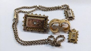 A selection of gold plated jewellery to include a Victorian brooch inset with an old cut diamond