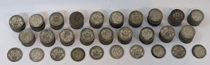 British coins - a quantity of 200 pre-1947 mixed George V and George VI shillings, various dates