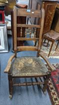 A 19th century ash and rush seated Windsor rocking chair Location: