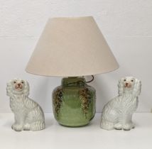 A green glazed lamp with flowers decoration and a pair of Staffordshire dog Location: