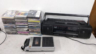 A mixed lot to include Hitachi cassette player, Pye cassette recorder and mixed CDs including rap