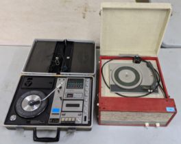 A Dansette Thames and a Sanyo solid state stereo music centre record players. Sanyo model G23IIKL-