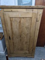 A 19th century pine single door wardrobe, stepped cornice and bracket feet 182x107x49cms Location: