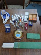 A collection of glass, porcelain, silver and other metal thimbles, to include a Victorian thimble in