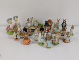 A collection of Beswick Beatrix Potter Bunny, kittens and others together with Royal Doulton figures