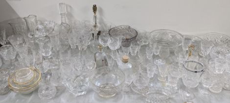 A large mixed lot of glassware to include crystal cut decanters, Stuart bowl, hock glasses and other