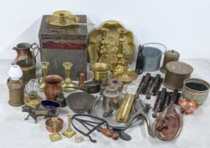 A mixed lot of metalware to include brass candlesticks, a copper jug, a Spanish pewter tray and