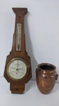 A Short & Mason wall hanging barometer together with a copper and brass twin handled vase Location:
