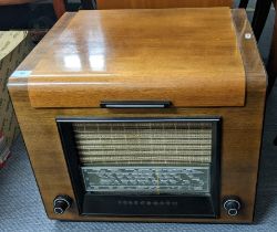 A mid 20th century Telefunken radio fitted with a Garrard SP25 turntable Location: