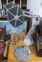 A star wars Tie Fighter table lamp, a lamp in the form of a bronze affect figural group and a