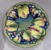 A Moorcroft Leaf and Berry pattern bowl designed by Walter Moorcroft A/F Location: