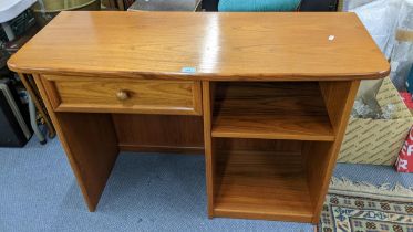 A mid 20th century G Plan teak desk having a single drawer and open shelves, 70hx106w Location: