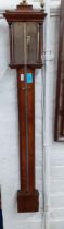 A Georgian stick barometer in a mahogany case inscribed indistinctly. Location: