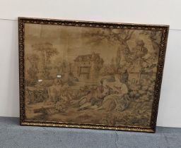 A framed and glazed tapestry depicting a country scene, a man playing his flute, children with a