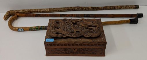 A wood jewellery box carved with a dragon, a Japanese carved bamboo walking stick and others