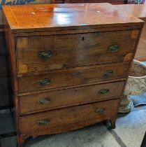 A George III mahogany secretaire chest having a fitted interior above three drawers and boxwood