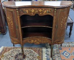 An Edwardian mahogany cabinet having marquetry inlaid and gilt metal mounts, central drawer above