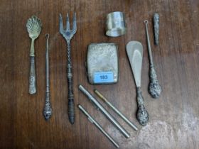 A group of silver items to include a George VI cigarette case with all over engraved scrolled leaf