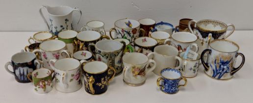 A collection of twenty six 19th and 20th century jugs to include Royal Crown Derby & Royal Doulton