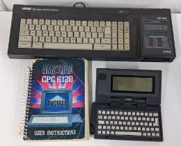 An Amstrad CPC6128 together with an Atari portfolio hand held computer Location: