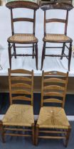 A pair of 19th century bar back chairs together with a pair of oak ladder back rush seated chairs