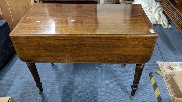 A 19th century mahogany gateleg table having single drawer and turned legs 71cm h x 92cm w Location: