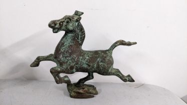 A Chinese bronze ornament flying horse of Gansu, modelled upon a flying swallow Location: