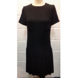 Chanel- A 1980's Boutique line Collection 28 black woollen dress with drop waist, 2 breast pockets
