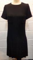 Chanel- A 1980's Boutique line Collection 28 black woollen dress with drop waist, 2 breast pockets