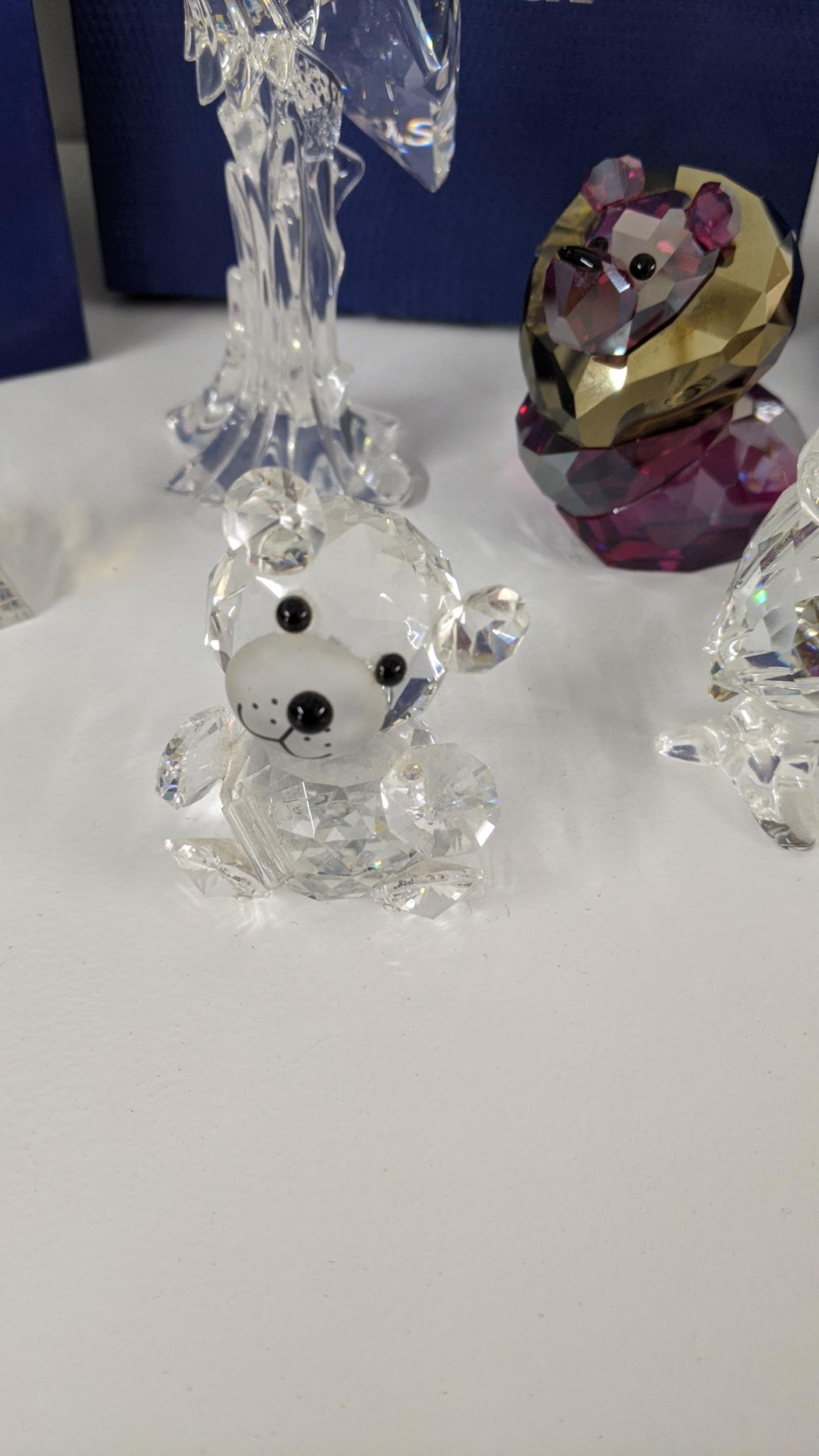 Mixed Swarovski crystal ornaments to include a stork, three owls, a lion and bear Location: - Image 5 of 6