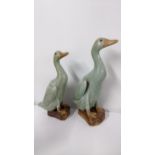 Two 20th century Chinse porcelain models of geese, character marks to the bases Location: