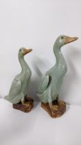 Two 20th century Chinse porcelain models of geese, character marks to the bases Location: