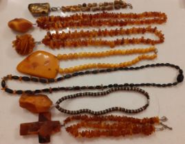 A group of late 20th Century amber and other necklaces, some with pendants. Location: