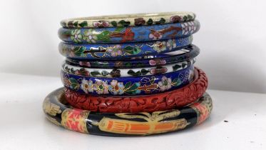 Mixed Chinese bangles to include cloisonne examples decorated with flowers Location: