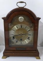 A 1960's Elliott 8-day lever mahogany mantel clock having a brass dial with cherub spandrels,