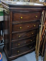 A modern mahogany bow fronted chest of five long drawers with brass turned handles 133cm h x 89.