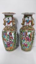 A pair of late 19th century Chinese Canton famille rose vases A/F Location: