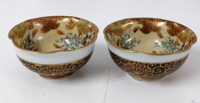 Japanese Satsuma tea bowls having floral decoration and character marks to the base Location: