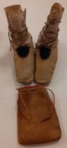 A pair of North American native Indian leather moccasins 27cm long with embroidered detail