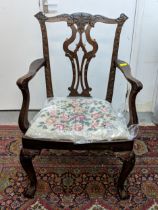 A 1920's reproduction of a George II mahogany carver chair with a tapestry seat Location: