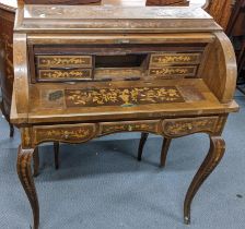 A mid 20th century Dutch style roll top bureau having floral marquetry inlaid, fitted interior above